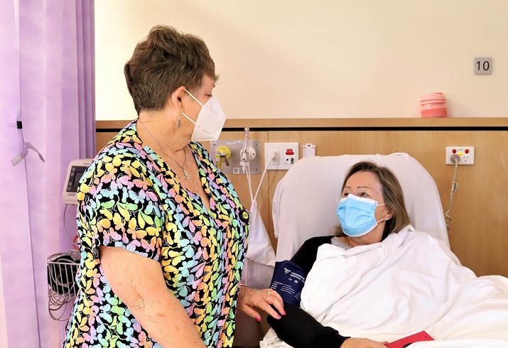 Image of Kerry with a patient on the Renal Ward Armadale Hospital